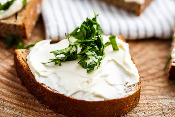 Sandwiches with melted cheese and herbs
