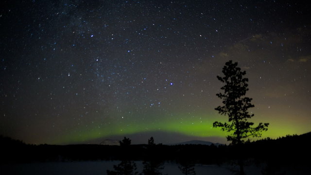 Time lapse Aurora Borealis shooting stars sky Northern lights Norway