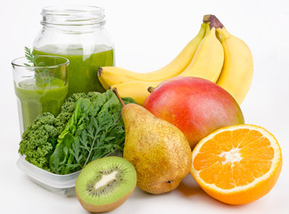 Green Smoothie With Leafs And Fruits