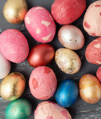 Easter eggs on wooden table. Holiday background