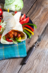 Tortilla with chili con carne.