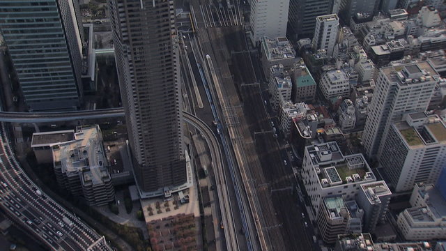 Aerial Shinkansen TGV Bullet train skyscrapers Tokyo Expressway Japan 