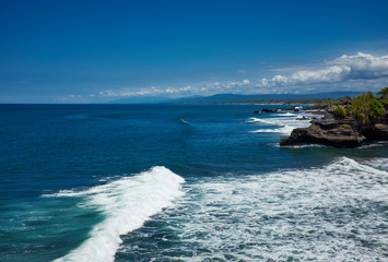 Tropical beach with volcanic rocks, Bali, Indonesia