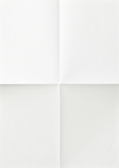 white sheet of paper folded in four