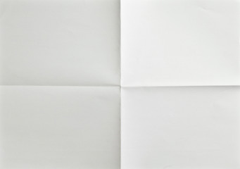 white sheet of paper folded in four
