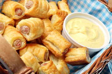 White sausage in puff pastry with joppie sauce