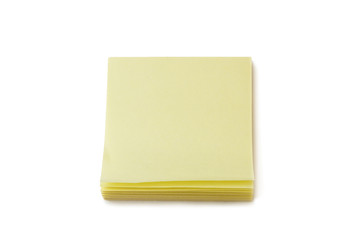 Stack of blank yellow Post-it notes, isolated on white