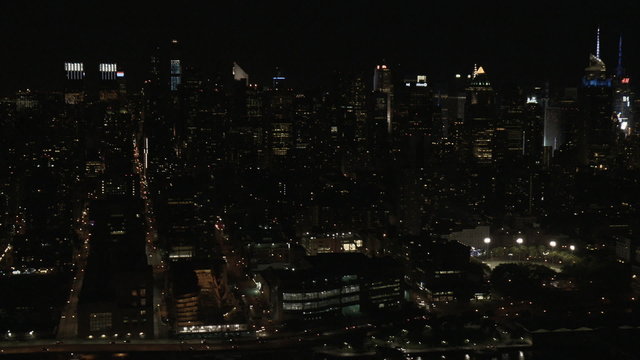 Aerial illuminated Manhattan skyscrapers Hudson River night New York 