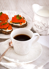Romantic breakfast with coffee and toasts