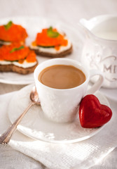 Obraz na płótnie Canvas Romantic breakfast with coffee and toasts