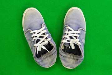 Canvas sneakers Placed on a green background