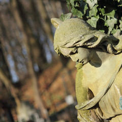Statue Of Women On Tomb