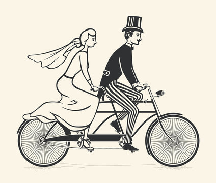 Fototapeta Bride and groom riding a vintage tandem bicycle
