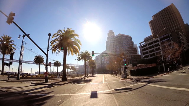 POV vehicle driving coastal bay road Oakland Bay Bridge California USA