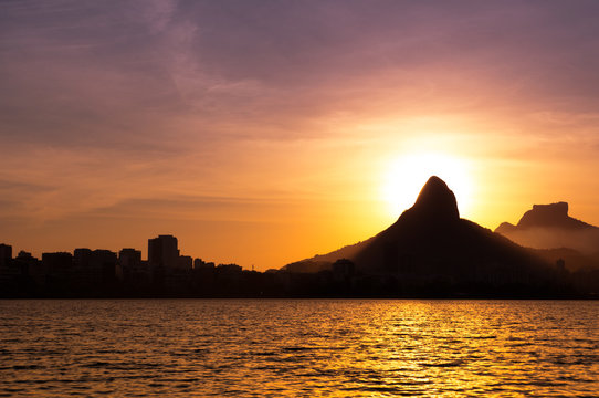 View of Rio de Janeiro Sunset Behind Mountains at the Lake