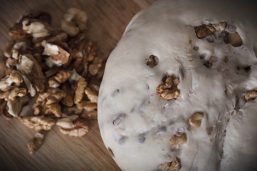 Homemade raw bread dough with  walnuts