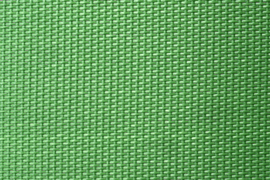 Green woven plastic background