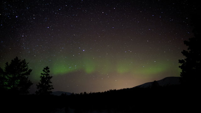 Time lapse Aurora Polaris shooting stars night sky natural solar light Norway