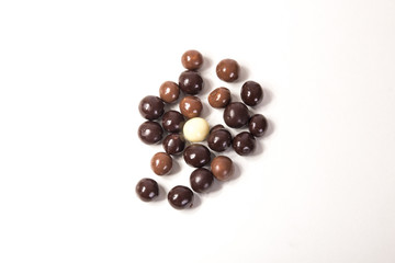 Chocolate balls on white background