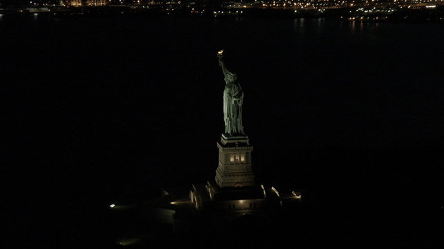 Aerial illuminated New York Statue of Liberty night New Jersey USA