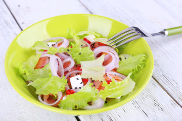 Fresh fish salad with vegetables
