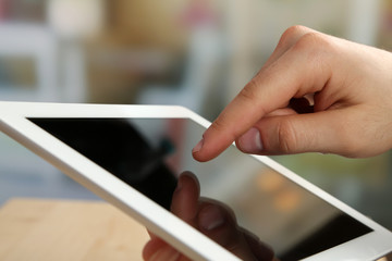 Hand using tablet PC