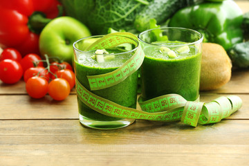 Green fresh healthy juice with fruits and vegetables