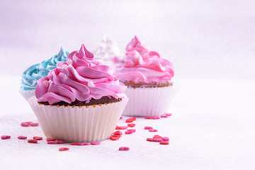 Delicious cupcakes on table close-up