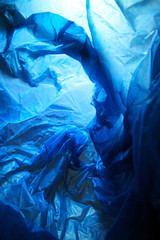 Abstract background of the insides of a blue plastic bag