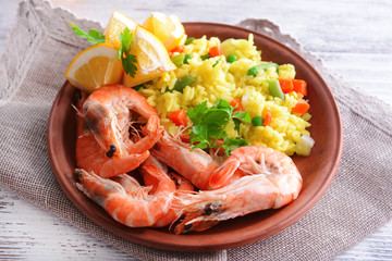 Seafood Paella on plate on table close-up