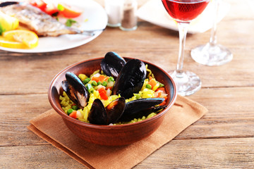 Seafood Paella on plate on table close-up
