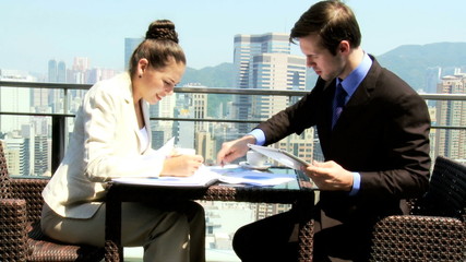 Smart Caucasian Share Brokers Wireless Tablet Meeting