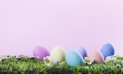 Easter painted eggs in the grass card