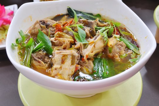 Thai food - Spicy chichken soup with herbs