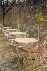 Tables of street cafes