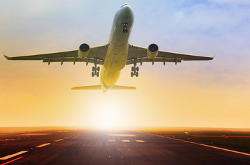 passenger jet plane take off fron airport runway with beautiful - obrazy, fototapety, plakaty