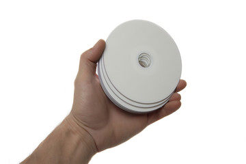  Hand with compact disks, isolated on white background