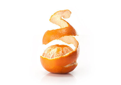Peel and orange wedge on white background