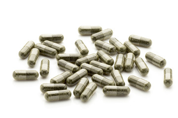 Homeopathic pills,  alternative medicine. On a white background.