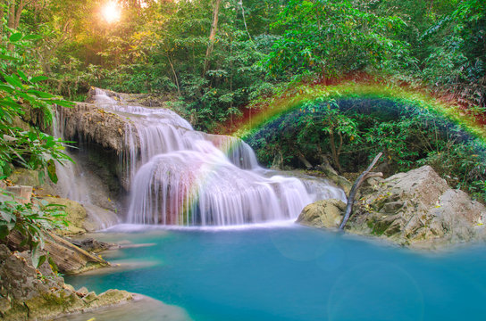 Fototapeta Wonderful Waterfall with rainbows in deep forest at national par