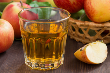 apple cider or juice in a glass, close-up