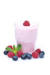 berry yogurt in a glass, isolated