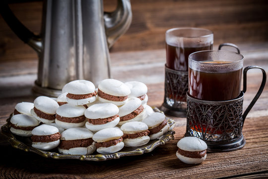 Chocolate macaroons served with coffee