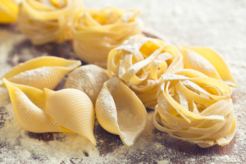 raw pasta and flour
