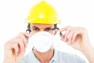 Fototapeta na wymiar Worker wearing protective glasses over white background