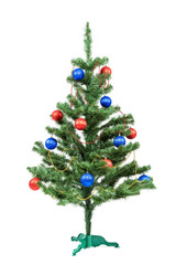 Christmas tree decorated red and blue balls on white background.