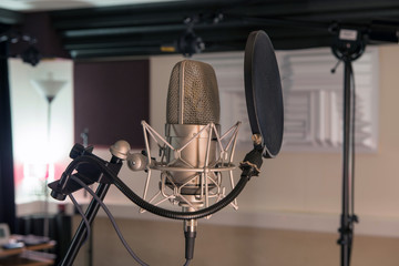 professional microphone in a recording studio