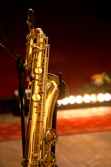 Baritone saxophone standing on stage