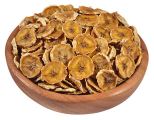 Dried bananas in a wooden bowl on a white