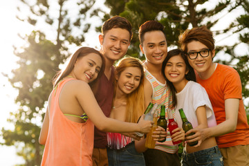 Clinking beer bottles